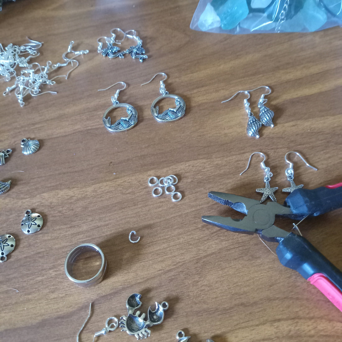 Tools and charms used for making earrings 