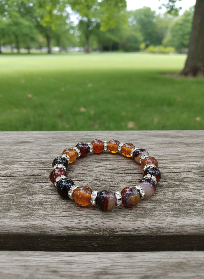 Beaded bracelet with multicolored beads in a park background