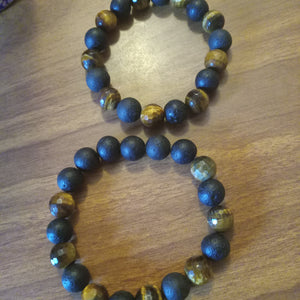 Men’s Black Lava & Tiger Eye Bracelet featuring natural stone beads for strength, confidence, and grounding energy—perfect for men’s fashion and spiritual jewelry collections.