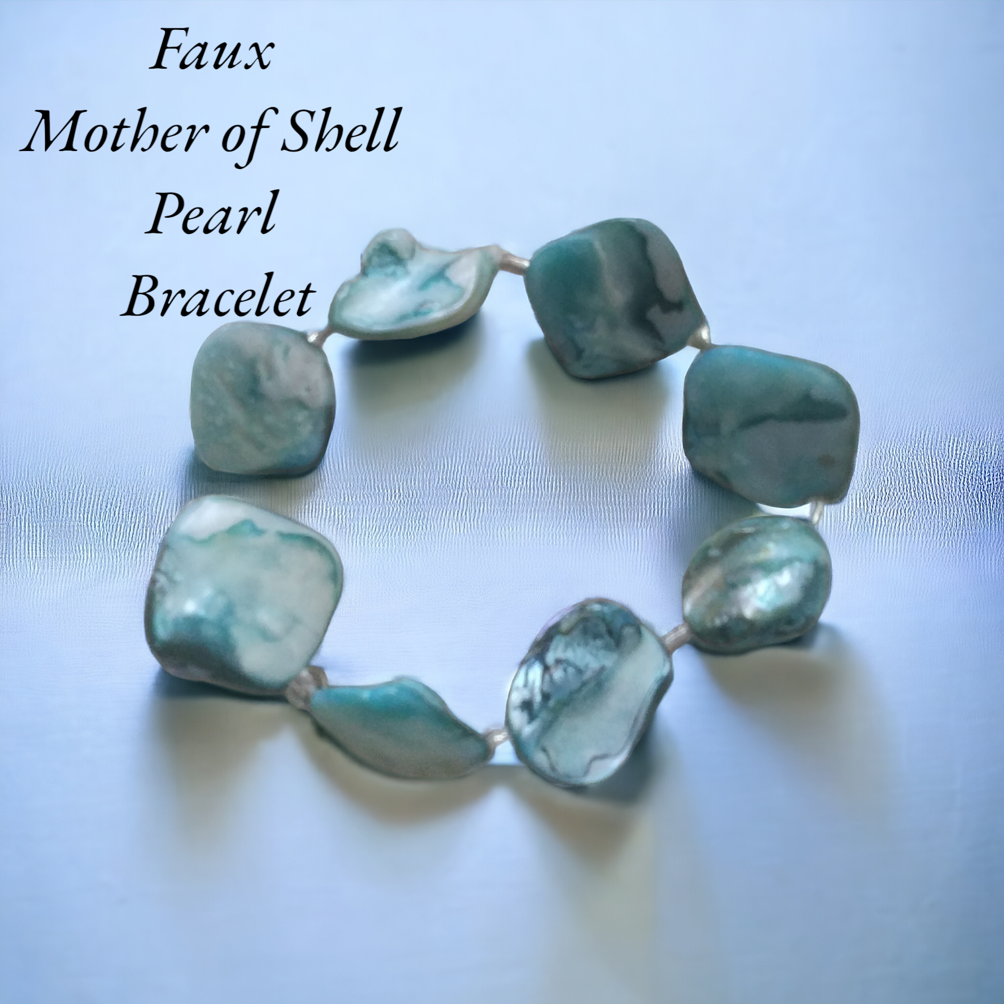 Handcrafted blue Mother of Shell pearl stretch bracelet with a radiant finish, designed for comfort and effortless elegance."