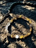 Beaded bracelet on a textured stone surface